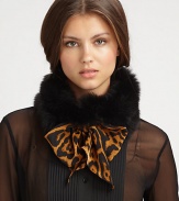 Make a statement with this luxurious, tie front design trimmed in dyed fox fur. 30% virgin wool/30% cashmere/40% silkAbout 7 X 59Specialist dry cleanMade in Italy Fur origin: Finland 