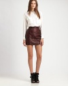 Achieve that city-ready look in a pencil skirt of burnished leather, roughened by edgy asymmetrical zippers and an ultra-short silhouette. Asymmetrical front zipperZippered slash pocketFully linedAbout 17 longLeatherDry clean with leather specialistImportedModel shown is 5'9½ (176cm) wearing US size 4.