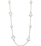 Sweet romance. This delicate sterling silver necklace features petite, cut-out hearts and cultured freshwater pearls (6-6-1/2 mm). Approximate length: 16-1/2 inches.