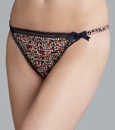 Feel fabulous in this printed, lace-trimmed, crepe thong.