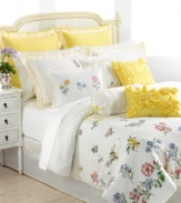 Sculpted of pure cotton, this decorative pillow from Lenox features embroidered scalloped hems in daffodil yellow over white. Darling yellow ribbon ties on each side serve to enhance the Flowering Meadow bedding collection.