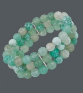 A taste of the tropics. Avalonia Road's destination-themed 3-row bracelet features pretty beads of green fire agate (55 ct. t.w.) with sterling silver accents. Bracelet stretches to fit wrist. Approximate length: 6-1/2 inches. Approximate width: 3/4 inch.