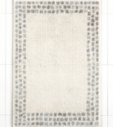 A breath of fresh air. Martha Stewart Collection revives your bathroom in carefree style with this Calendula bath rug, featuring a solid backdrop with a stripe border. Finished in soothing, neutral tones.