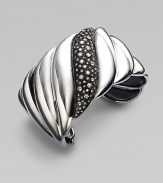 From the Midnight Melange Collection. A sculpted sterling silver cuff with diamond pavé accents.Diamonds, 1.73 tcw Sterling silver Width, about 1½ Imported 