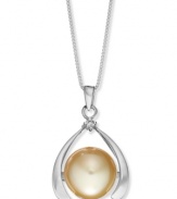 Good luck and a touch of polish. This sophisticated horseshoe-shaped pendant features a cultured golden South Sea pearl (11-13 mm) and a sparkling diamond accent. Set in sterling silver. Approximate length: 18 inches. Approximate drop: 1 inch.