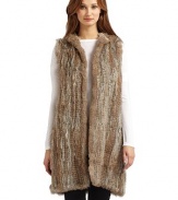 THE LOOKOpen front necklineFur hoodSleevelessTHE FITAbout 34 from shoulder to hemTHE MATERIALGenuine rabbit furCARE & ORIGINDry clean by fur specialistImportedFur origin: China