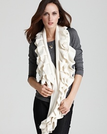 A ladylike ruffle scarf adds a new dimension to cold weather style.