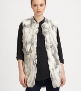 A textured natural or dyed rabbit style in an easy to layer vest design. Stand collarSleevelessOpen frontAbout 30 from shoulder to hemFully linedDyed or natural rabbitSpecialist dry cleanImported Fur origin: China