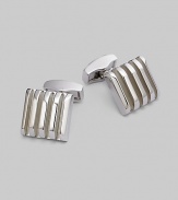 A sophisticated touch in rhodium-plated metal with grill detail. T-backing About ½ square Imported 