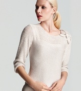 Intricate braiding at the shoulder of this sophisticated Escada sweater lends a luxe touch to the elegant piece, gorgeous with flowing skirts for dinner dates and cocktail parties.