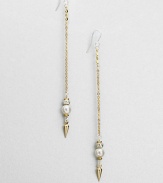 From the Mini Collection. Long golden chains with sterling silver stud tops and Swarovski pearl accents dangle delightfully and delicately.Glass pearlsSterling silver and goldplateDrop, about 5Ear wireMade in USA