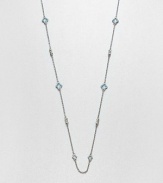 From the Estate Collection. Beautifully faceted blue topaz stone set in intricately designed, sterling silver on a delicate link chain. Blue topazSterling silverLength, about 34Lobster clasp closureImported