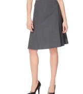 Calvin Klein's sleek A-line skirt always makes the right impression. Pair it with a fitted jacket and a silk blouse to complete the look.