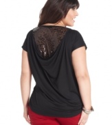 Leave them wanting more in Jessica Simpson's short sleeve plus size top, showcasing a sequined back!