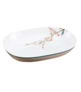 Make every meal sing with the bright watercolor-inspired birds and florals that adorn this Chirp serving bowl. Built for lasting luster and strength in dishwasher- and microwave-safe bone china from Lenox Simply Fine. Qualifies for Rebate