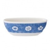 Vintage charm meets modern durability in the Farmhouse Touch amuse bouche bowl, featuring fresh white blooms on cornflower-blue porcelain from Villeroy & Boch.