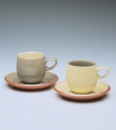 Warm, natural colors and a retro feel combine in this simple, curved mug. From Denby's dinnerware and dishes collection.