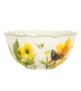 Garden party. The Floral Meadow fruit bowl brings eternal spring with a mixed bouquet rooted in resilient everyday porcelain. A scalloped edge and green banding add to the charm of the graceful mix-and-match Lenox dinnerware collection. Qualifies for Rebate