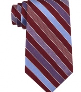 Spiffy stripes put a new angle on any outfit with this silk tie from Michael Kors.