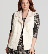 Reverse seaming lends intrigue to this Karen Kane faux fur vest--a glamorous accent to your seasonal wardrobe.