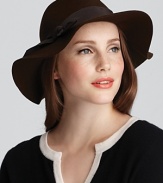 Exude effortless style in a wool felt fedora style hat with grosgrain ribbon trim.