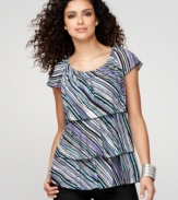 Mixing graphic stripes and feminine ruffles is always a good idea! Try Style&co.'s cool top with jeans or capris.