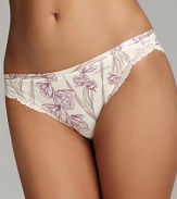 An ultra soft floral print bikini with lace accents at hips for a flattering style.