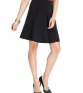 Nine West puts a modern spin on a classic skirt: an elegant silhouette gets a fresh look with an inverted pleat in front.