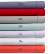 Ultimately soft in brushed cotton twill, this Lacoste sheet set is the perfect blend of sporty style and laid-back comfort. The signature Lacoste croc logo adds preppy flair to the flat sheet and pillowcases, now in a wide array of vivid hues. Croc logo coordinates with sheet color.