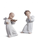 Take note. With the sweet face and wings of an angel in beautifully glazed porcelain, this flute-toting Lladro figurine makes any home sing. Shown right.