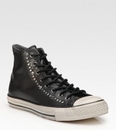 A classic Converse look in smooth leather with nailhead stud detail. Rubber toe cap Padded insole Rubber sole Imported 