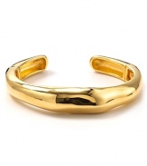 High shine and an undulating, organic shape made this cuff look like molten gold. By Alexis Bittar.