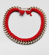 A chunky chain, with the look of a vintage ID bracelet, is modernized with bright red braiding with tassels and a fun paper-clip clasp.GoldplatedCottonLength, about 16.5Spring ring paper clip claspMade in France