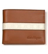 Perfect down to the last detail, this fine leather wallet features signature Gancini logos on a contrast stripe exterior.