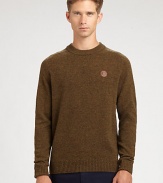 A classic crewneck pullover with a rich, textured finish lending a dapper effect to a casual pullover look.CrewneckRibbed knit collar, cuffs and hemLambswoolDry cleanImportedThis style runs true to size. We recommend ordering your usual size for a standard fit. 