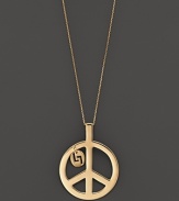 A simple, elegant peace sign in 14K yellow gold. By Lana.