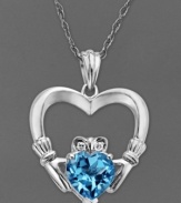 Celtic inspiration. This beautiful Claddagh pendant features a heart-shaped blue topaz (1-5/8 ct. t.w.) a sparkling diamond accent and a polished sterling silver setting. Approximate length: 18 inches. Approximate drop: 1/2 inch.