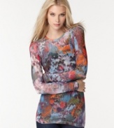 Add a burst of color to your casual lineup with BCBGMAXAZRIA's long sleeve top, flaunting an abstract print.