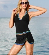 A flattering halter silhouette with bold pop color ruffle accents make this classic Profile by Gottex tankini top a must have this season.