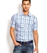 Shorten your seasonal look with this plaid woven shirt from Nautica.