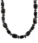 Bold in black. This sterling silver necklace features onyx (8-20 mm) stones in a variety of shapes for a stylish touch. Approximate length: 24 inches.