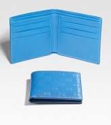 GG coated fabric with leather interior and trim. Two bill compartments Six credit card slots 4¼W X 3¾H Made in Italy