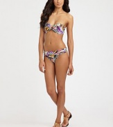 A vivacious design featuring an intoxicating butterfly print, complemented exquisitely by flattering, ruched sides.Fold-over waistbandRuched sidesModerate coverageFully lined85% polyamide/15% spandexHand washImported Please note: Bikini top sold separately. 