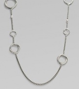 From the Infinity Collection. A signature Yurman box chain of sterling silver is gracefully stationed with cable-and-smooth interlocking rings and sprinkled with tiny white pearls. 5.5mm white cultured freshwater pearls Sterling silver Length, about 44 Toggle closure Imported