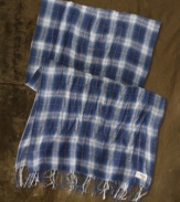 Layer your ensemble with a plaid wool scarf for added warmth and rugged downtown style.