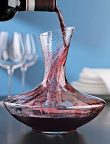 Stunning, rippled glass decanter offers optimal aeration as it enhances the presentation and aeration of your wine. These aerating waves help to open up your wine as you pour it in the decanter, swirl and serve. A wide base gives wine plenty of breathing room, while the angled mouth provides a dripless pour. Mouthblown of lead-free crystal 9¼H 47¼ oz. Hand wash Imported