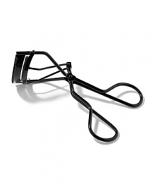 Curling your lashes is an instant eye opener. Bobbi's Eyelash Curler gives lashes a natural-looking curl and is designed for use on lashes before applying mascara. Crafted in black metal. Includes one replacement pad.