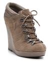 Sleek suede wedges take hiking boot styling for a trek through the urban jungle. By Aqua.