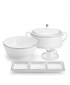 Like the grosgrain ribbons that dangle from her famous dresses, this white bone china collection of dinnerware and dishes from Vera Wang features two different platinum grosgrain borders. The wide corded border of textured grosgrain evokes soft elegance while the narrow wisp of platinum edging adds chic style. Espresso saucer shown right.