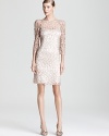 This exquisite Kay Unger lace dress is flecked with sparkling sequins for a dose of glamour.